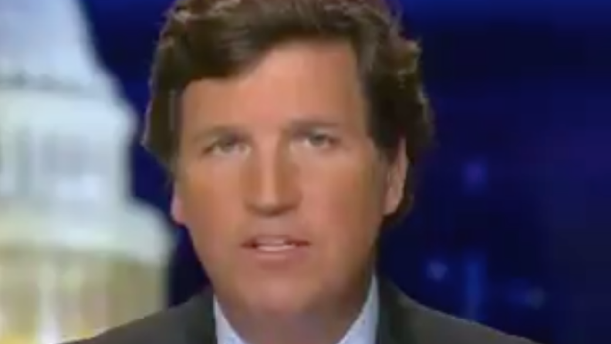 Tucker Carlson ridiculed for saying QAnon doesn’t exist because it doesn’t have ‘a website’