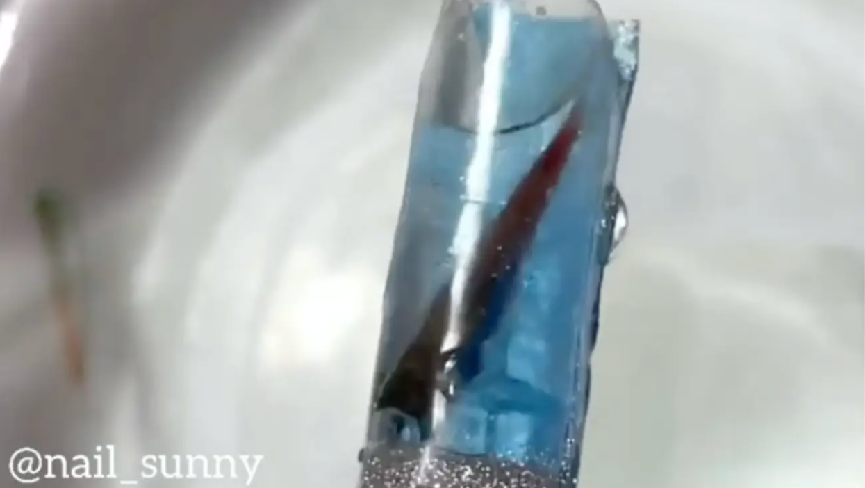 Beauty salon sparks huge backlash after putting live fish into a false nail
