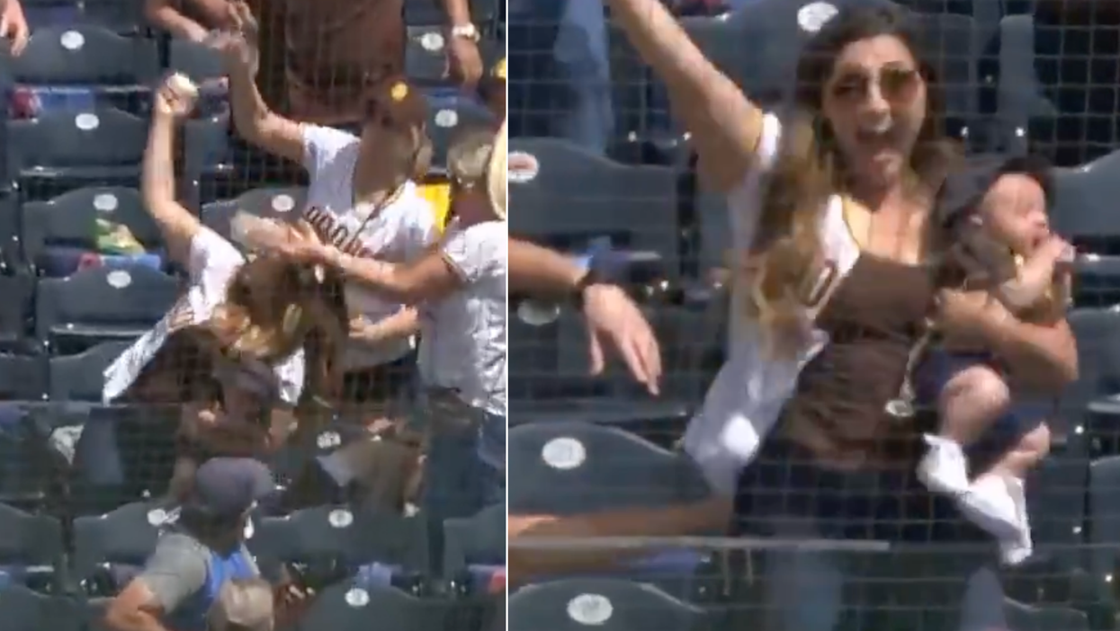 Moment mum catches baseball one-handed from the stands while holding her baby