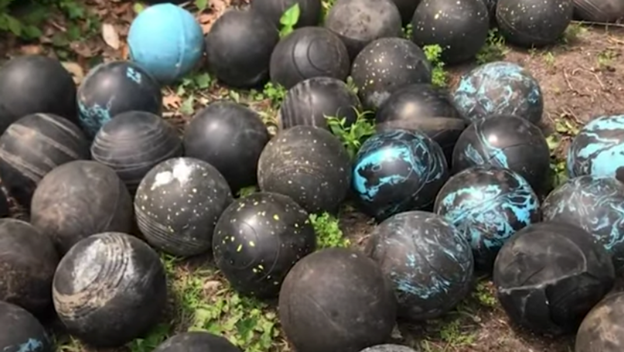 Man finds more than 150 bowling balls mysteriously buried beneath his house