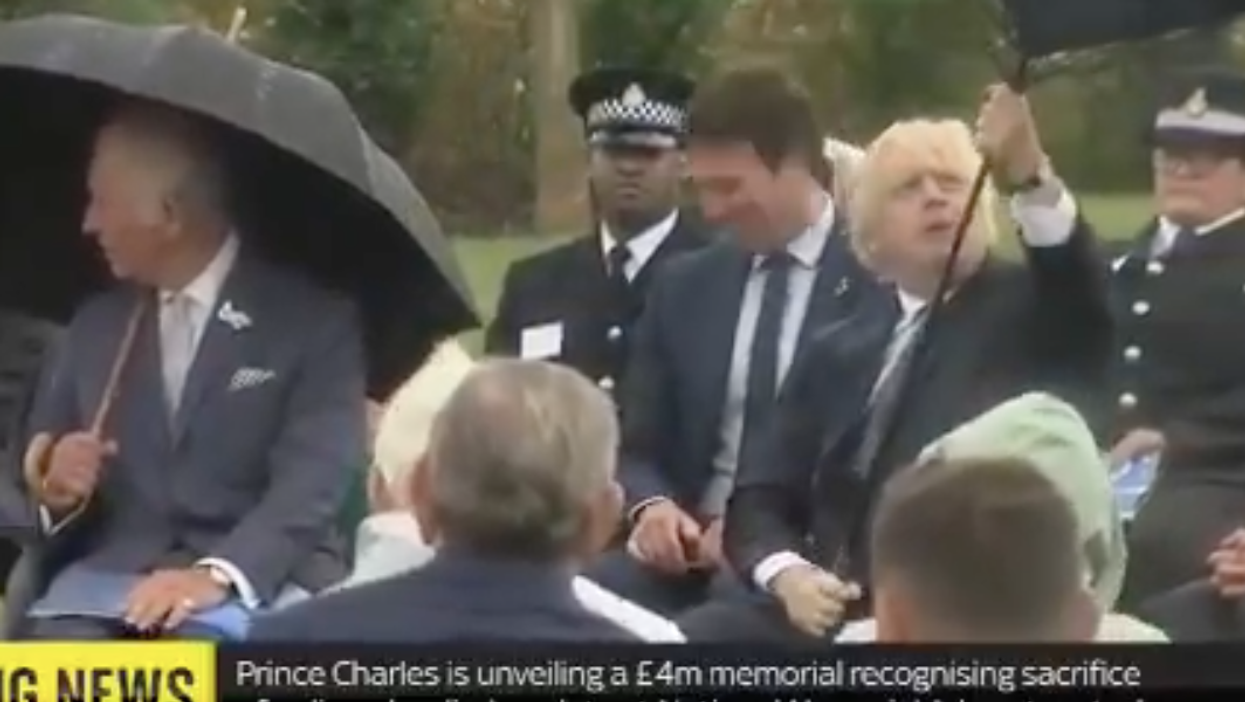 Boris Johnson just had an absolute nightmare with an umbrella while sitting next to Prince Charles
