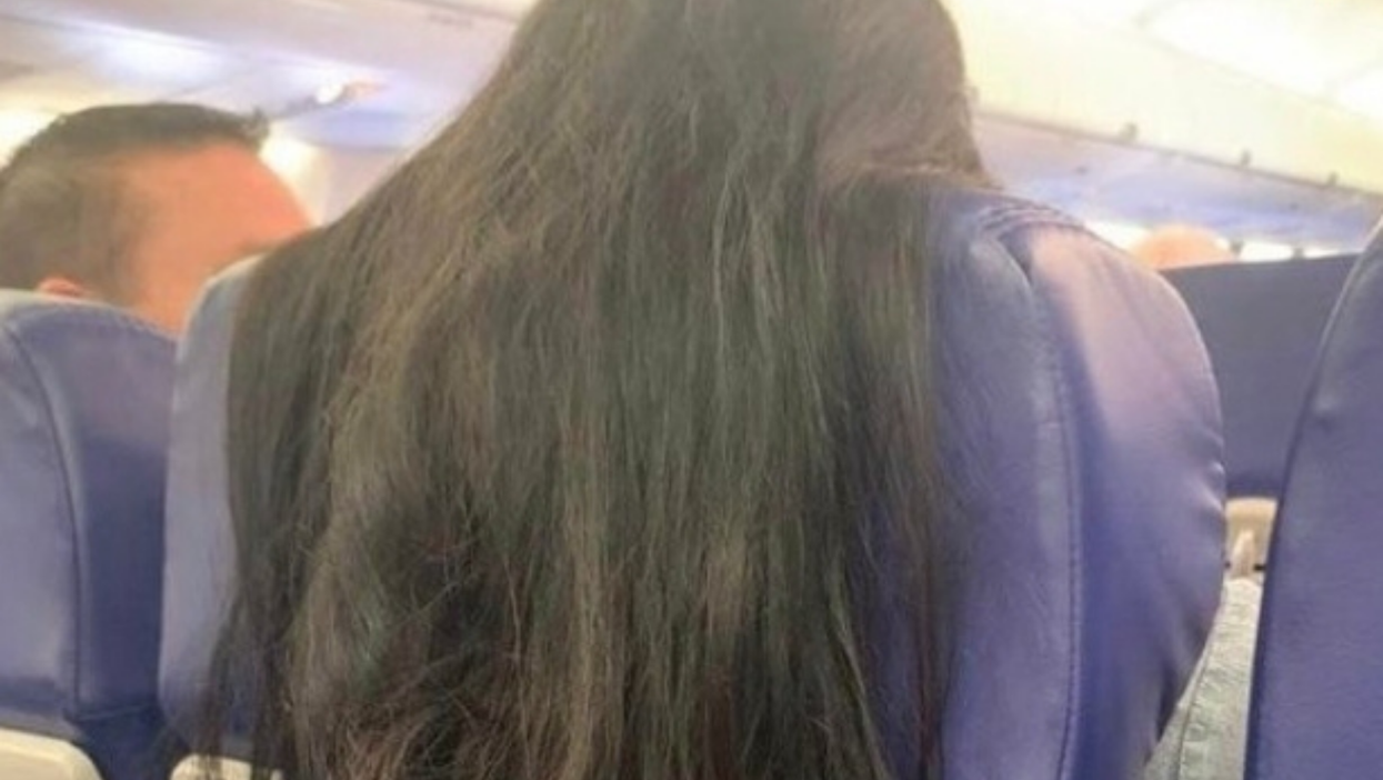 Internet fumes at viral photo of plane passenger’s ‘inconsiderate’ hair