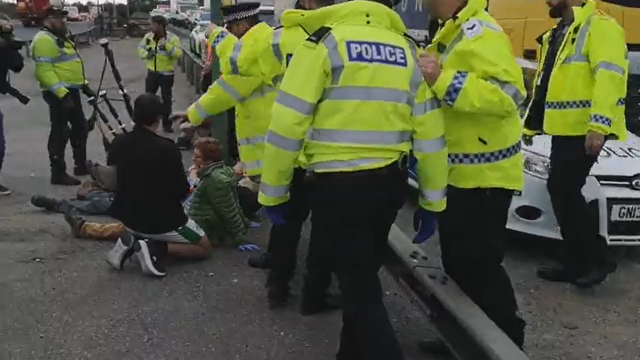 Moment fed-up motorist held up by Insulate Britain plays bagpipes in protesters’ faces