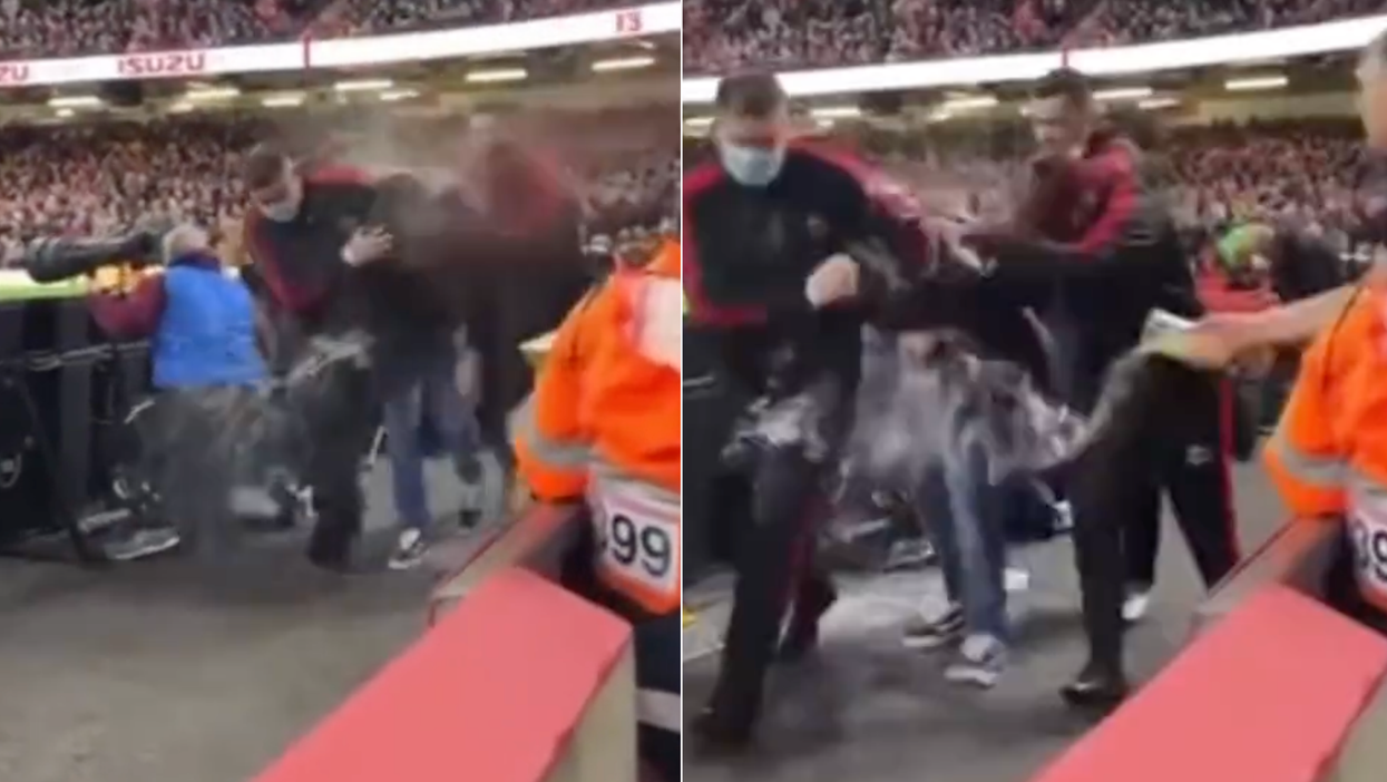 Video shows rugby pitch invader being soaked with beer by furious fans