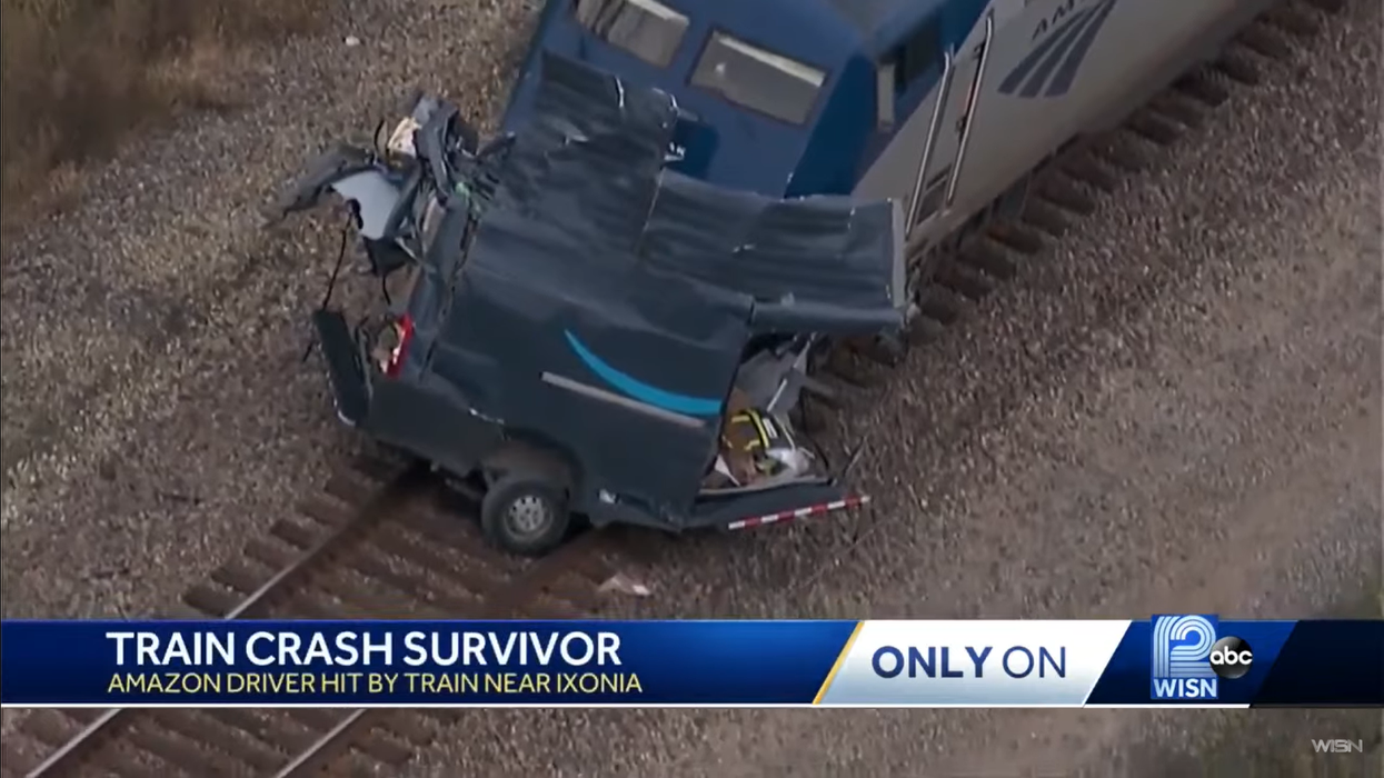 Amazon delivery driver lucky to be alive after train slices his van in two in dramatic crash