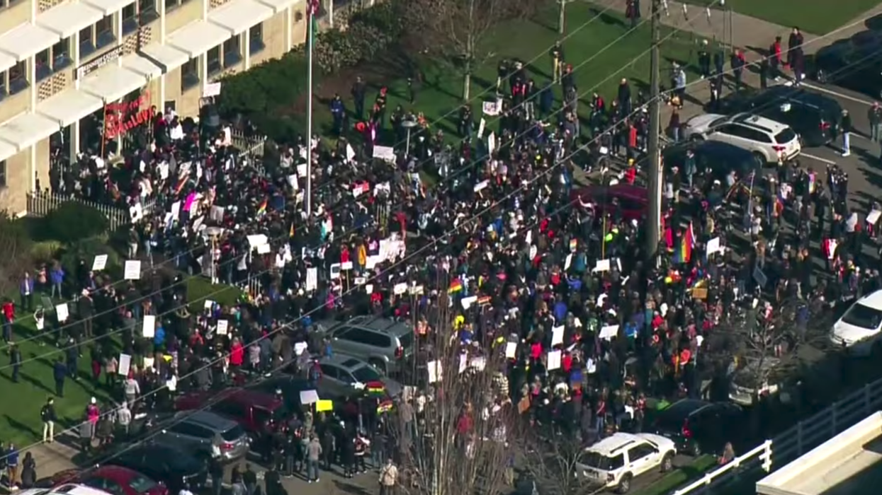 These students staged a mass walkout after their teachers were fired 'for being gay'