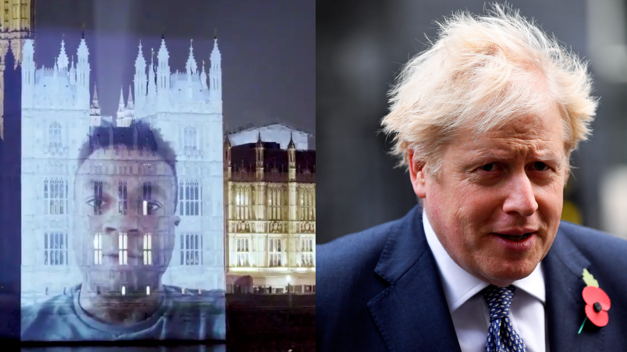 Message beamed onto parliament urging Boris Johnson to follow through on his promise to meet families affected by the pandemic