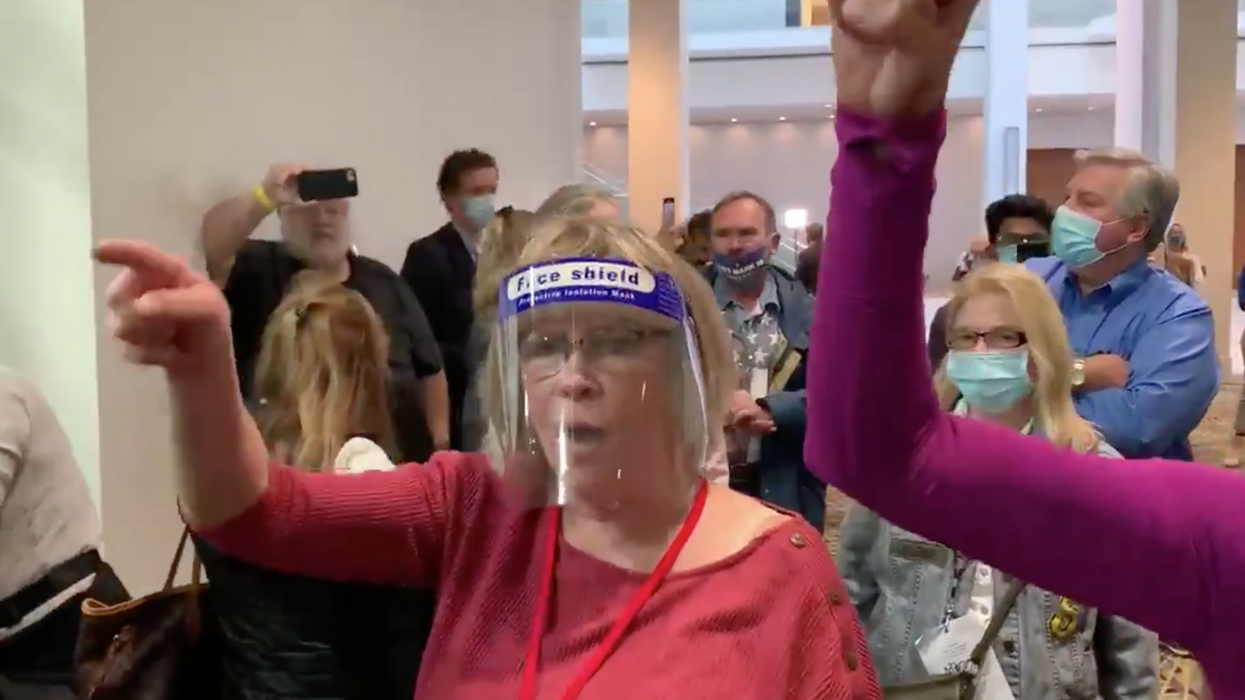 Shocking footage shows Trump supporters yelling at polling stations to stop votes being counted