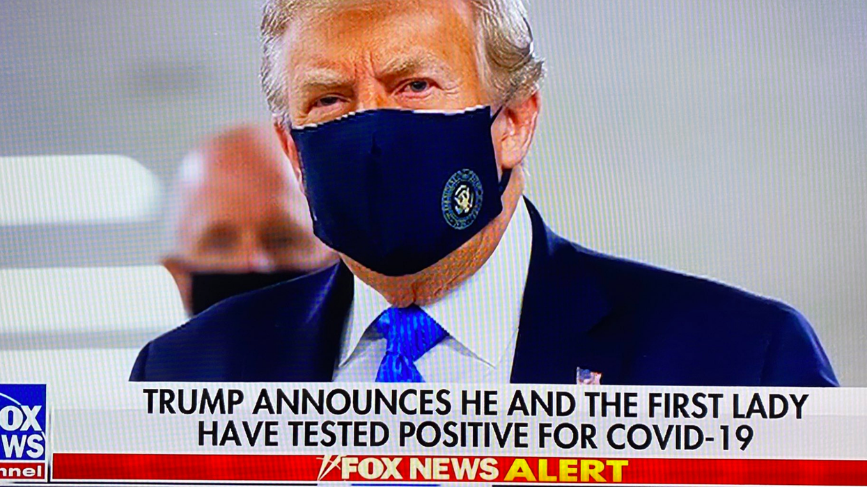 People are calling Fox News 'misleading' after it used a rare photo of Trump wearing a mask to reveal his Covid-19 diagnosis