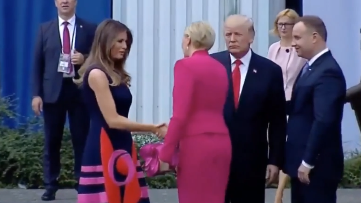 Trump left hanging when Polish President's wife walks straight past him as he tries to shake her hand