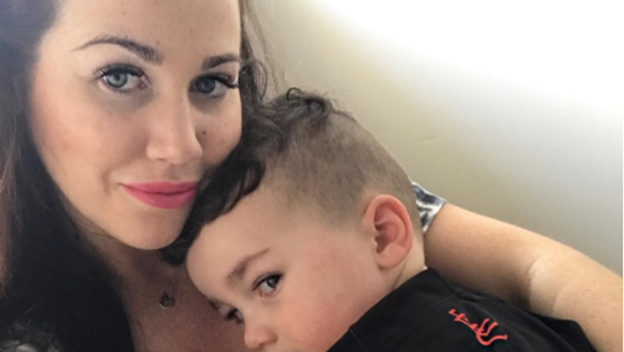 The grim truth behind this photo reveals what it's really like to be a mother