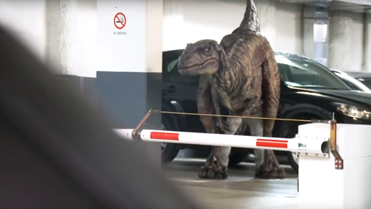 Pranksters are terrifying their colleagues with the most realistic dinosaur costume ever