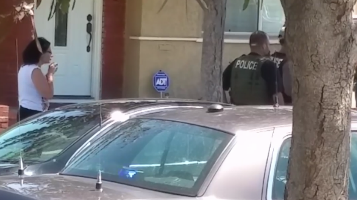 US officer smashes woman's phone after she films him