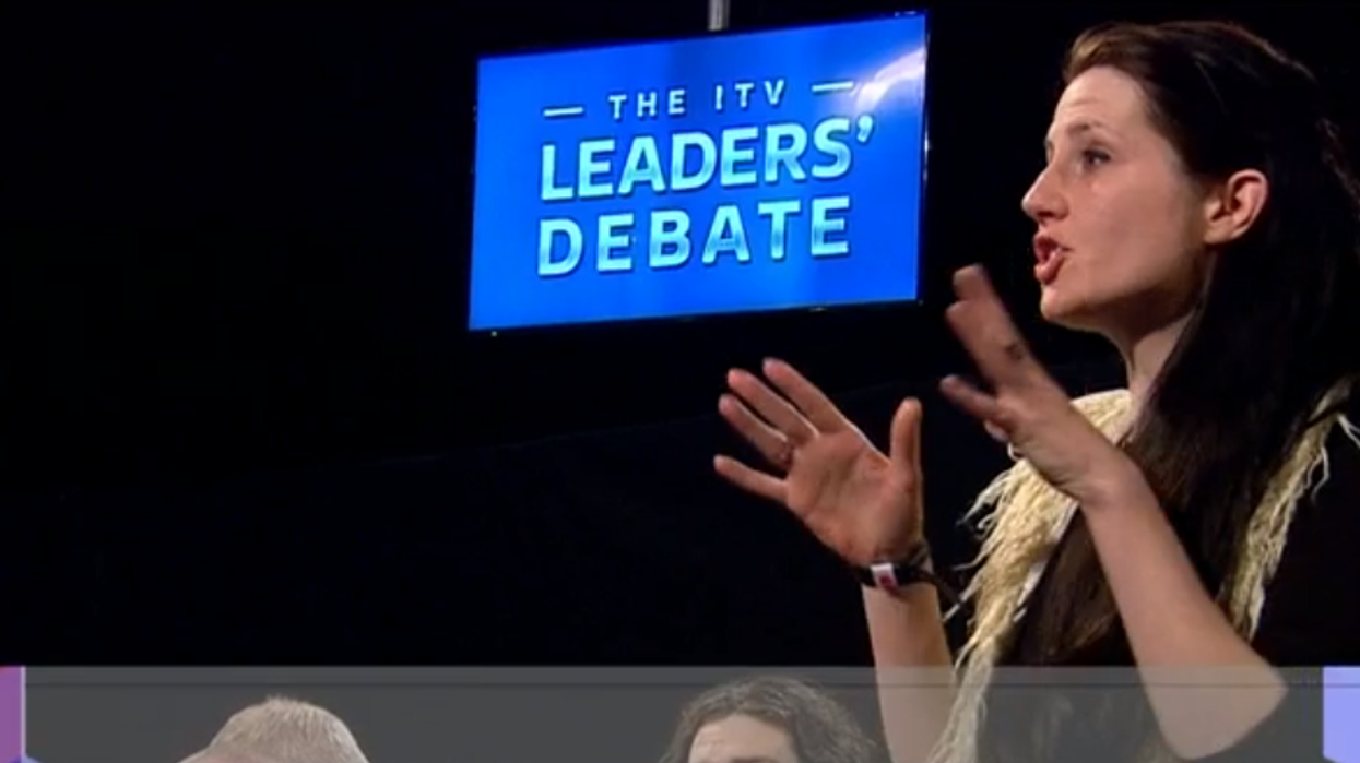 David Cameron heckled at leaders' debate