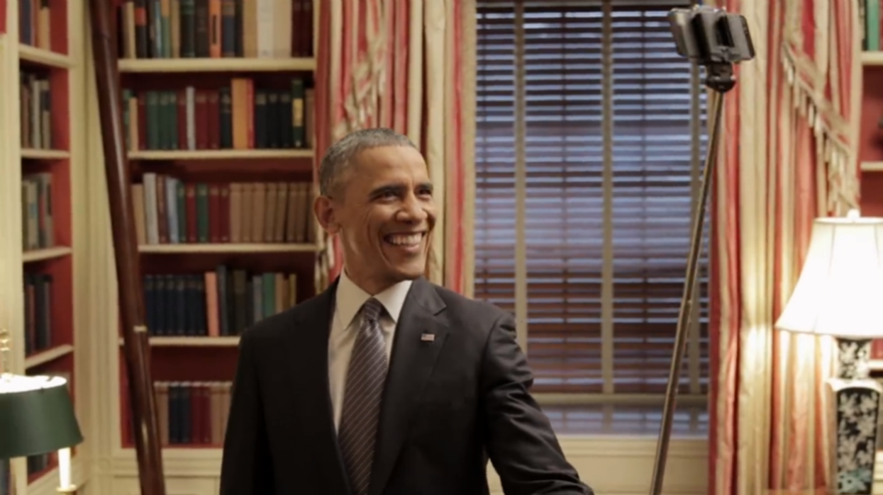 Here is a video of Barack Obama using a selfie stick