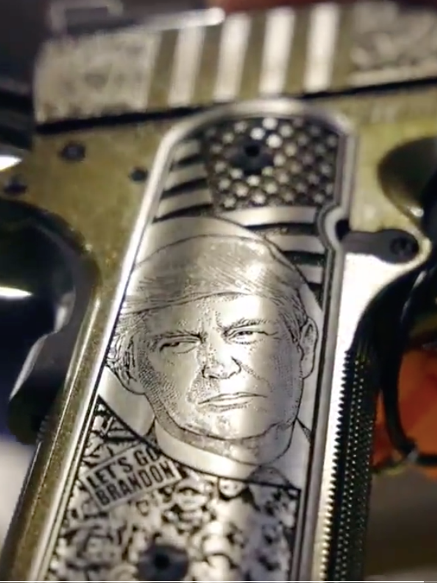 “Let’s Go Brandon” engraved Trump guns on sale at NRA convention