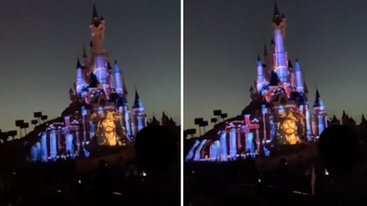 Johnny Depp as Captain Jack Sparrow projected onto Disneyland castle despite being dumped from franchise
