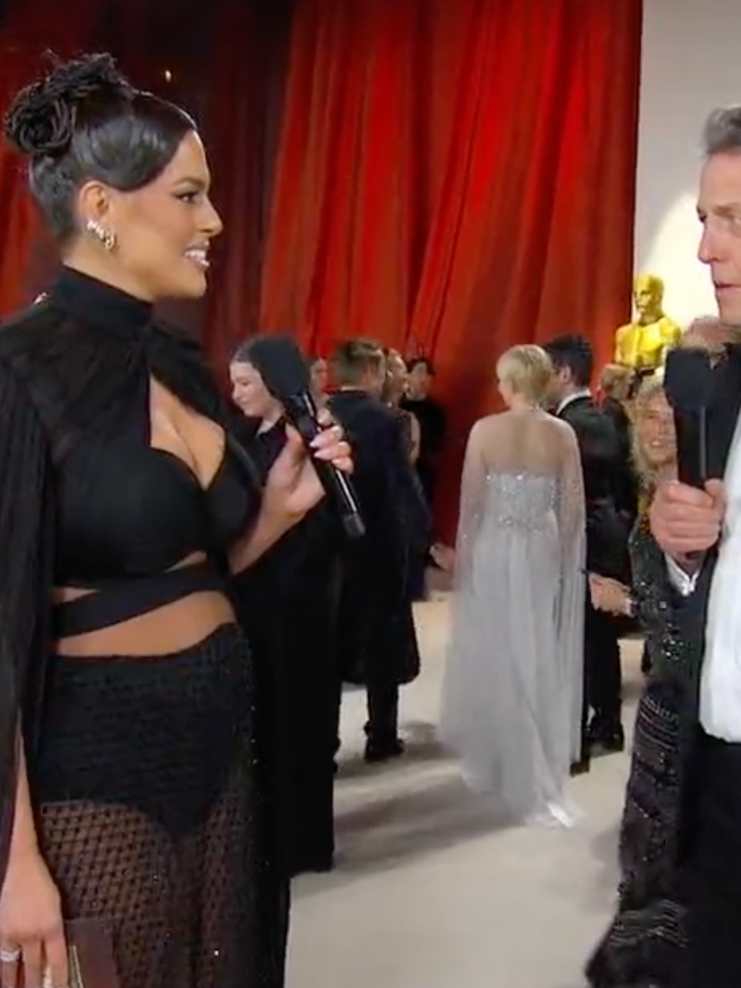 Hugh Grant branded 'biggest d*** in world' for 'rude' Ashley Graham interview at Oscars