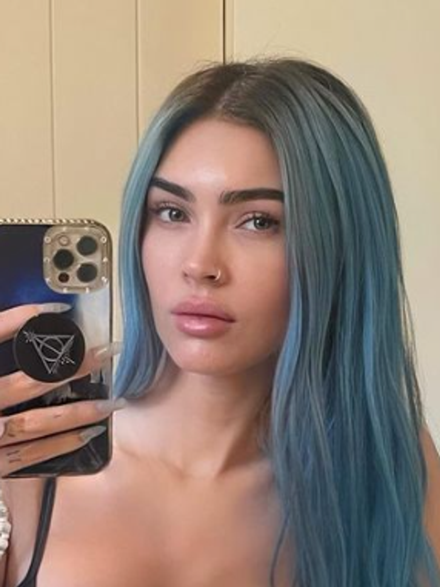 'Unrecognisable' Megan Fox shocks fans after sharing rare minimal make-up selfie