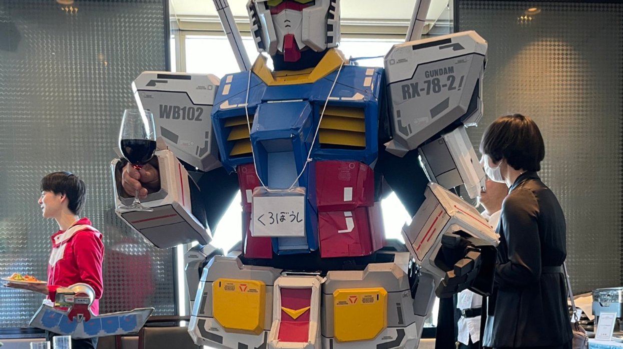 Man attends friend's wedding as a Gundam robot after being asked to wear a 'suit'