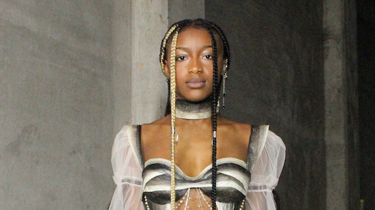 Young fashion designer has people in awe over viral salmon skin outfit