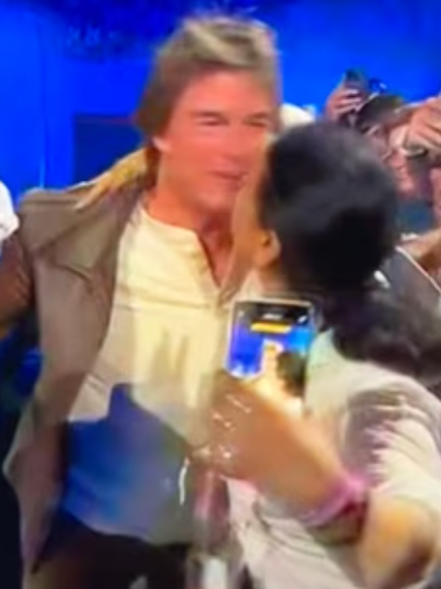 A woman forcibly kissed Tom Cruise at the Olympic closing ceremony. Now it has sparked a consent debate