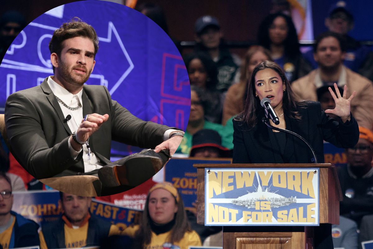 Hasan Piker hugs Rep. Alexandria Ocasio-Cortez at the Zohran Mamdani victory party