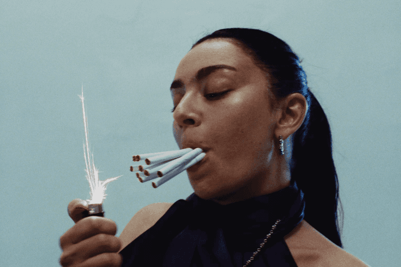 girl smoking a cigarette Shes a bad girl by nature. Portrait of an attractive young woman smoking a cigarette. Stock Photo by YuriArcursPeopleimages girl smoking a cigarette Shes a bad girl by nature. Portrait of an attractive young woman smoking a cigarette. Stock Photo by YuriArcursPeopleimages