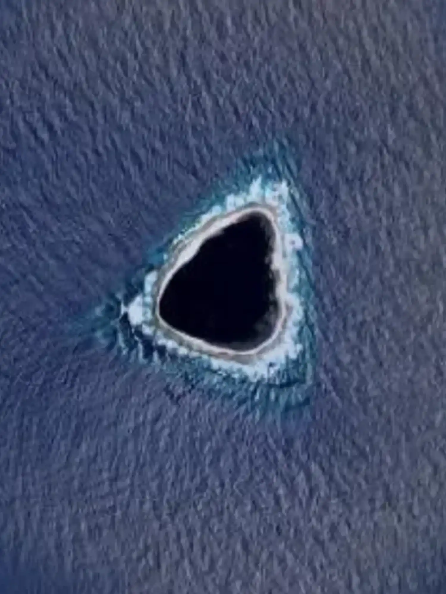 Incredible footage of 'hollow island' in middle of ocean shared by divers