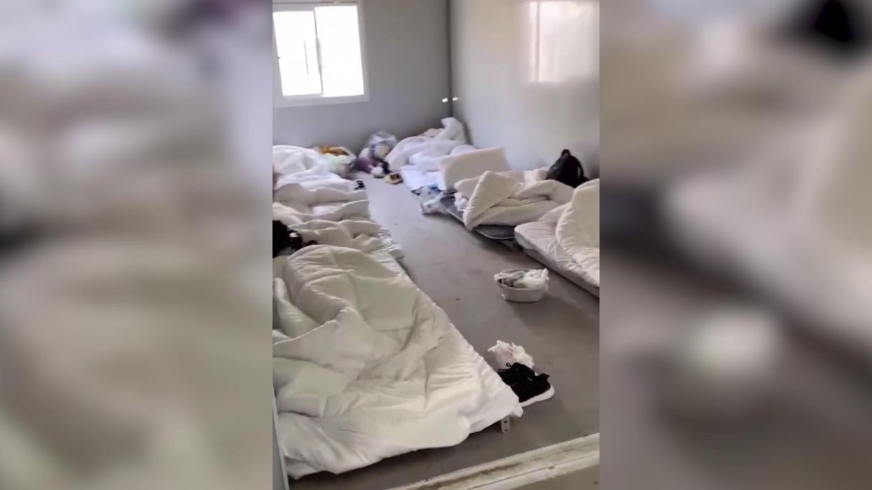 Inside brutal Shanghai quarantine centre where Covid patients sleep on wooden pallets