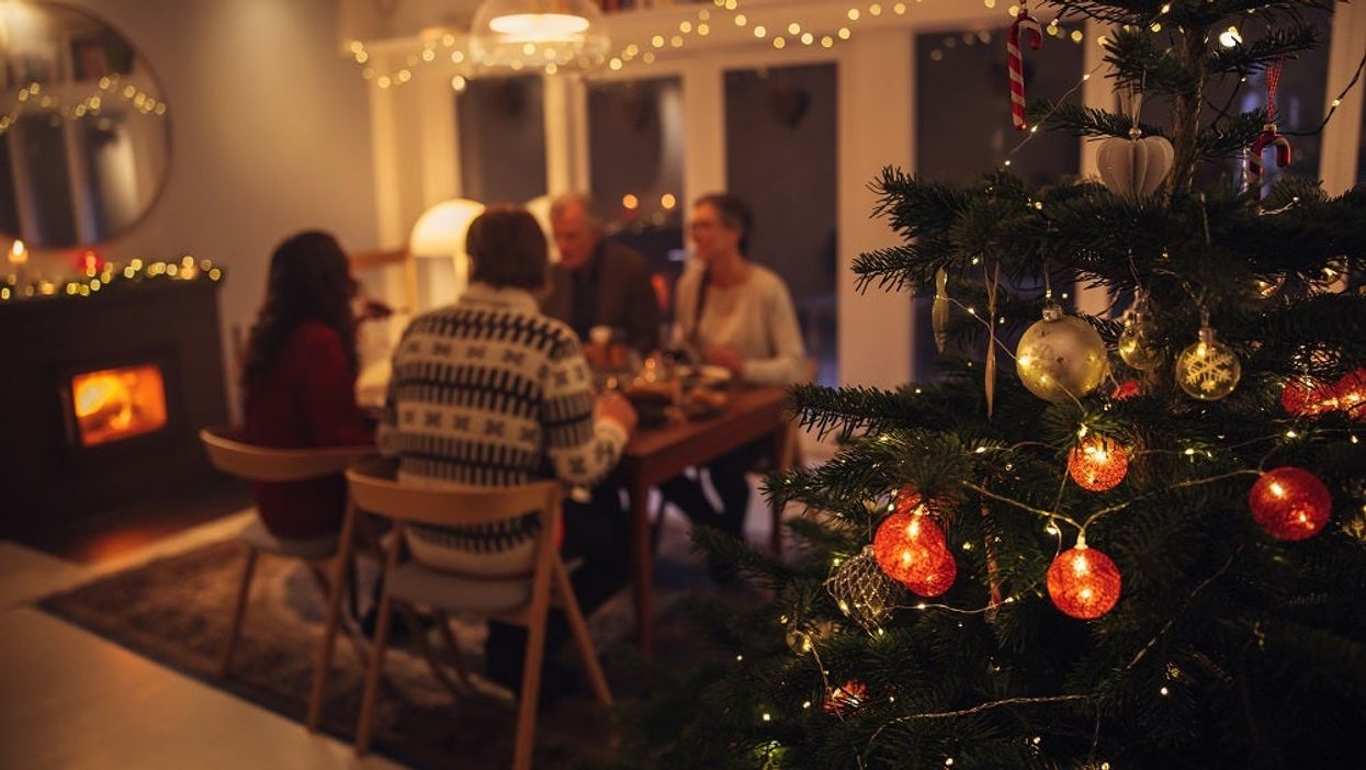 <p>Interior shot of warm and cozy scandinavian home decorated for Christmas celebration.</p>