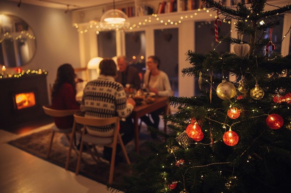 <p>Interior shot of warm and cozy scandinavian home decorated for Christmas celebration.</p>