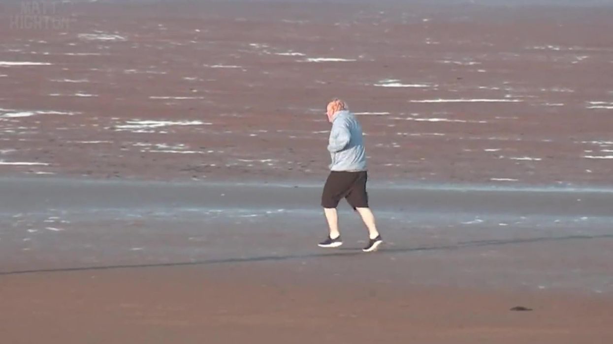 Someone added the Baywatch theme to a clip of Boris Johnson jogging on the beach