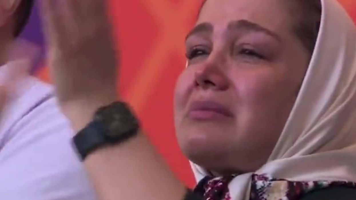 Iranian players refuse to sing national anthem at World Cup in solidarity