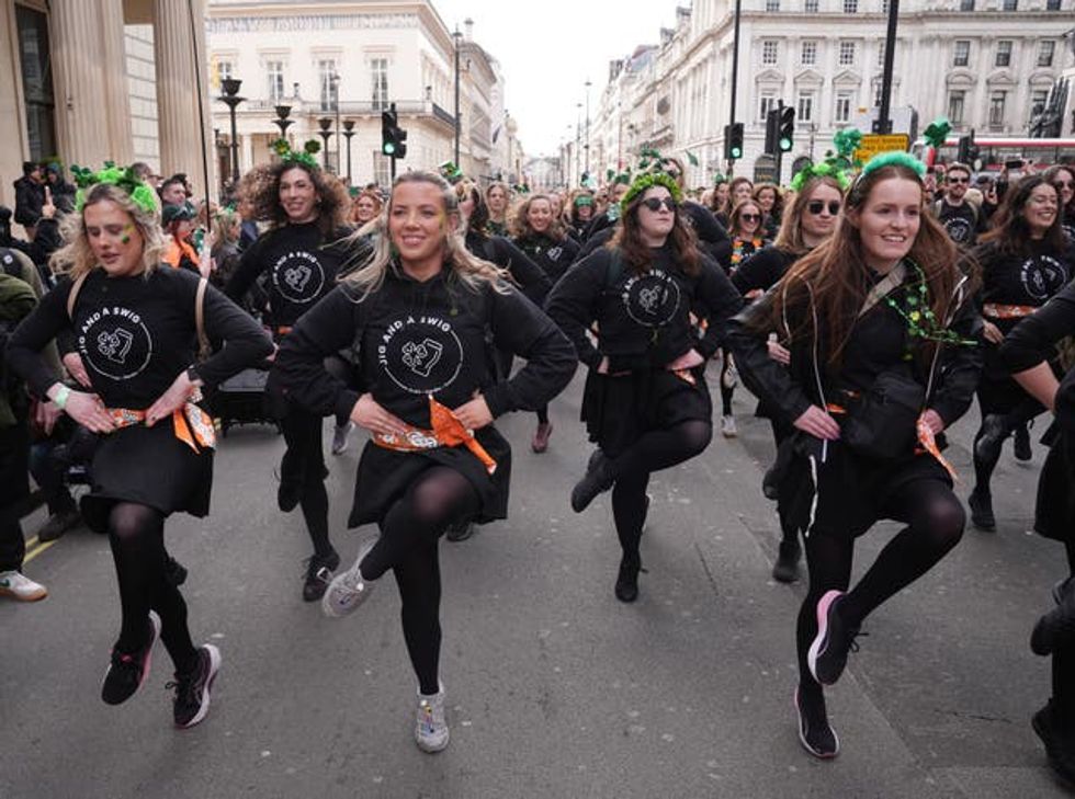 Irish dancers dressed in black