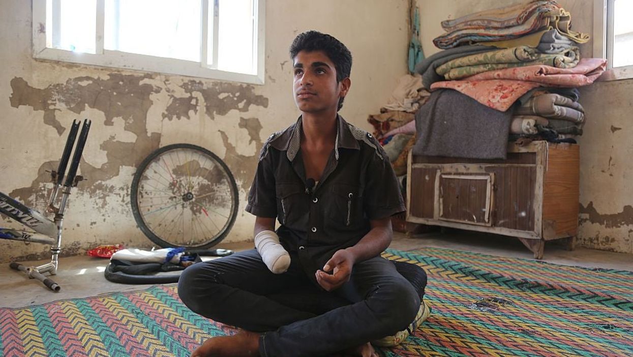 Isis amputates the hand of teenager they accused of theft. Picture: