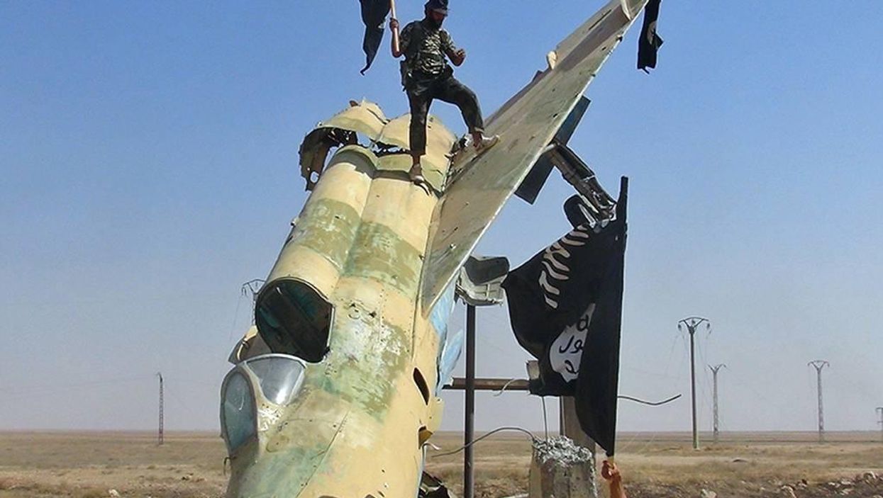 Isis troops near Raqqa, Syria