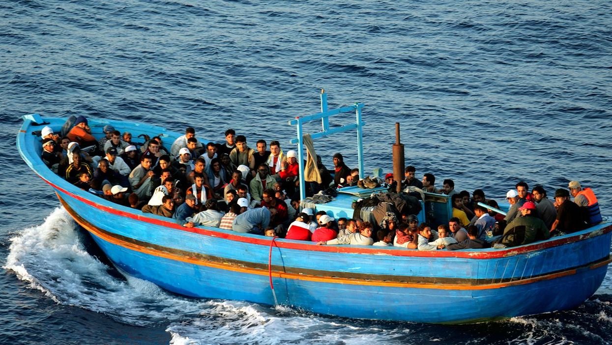 Italian border patrols pick up migrants in 2005