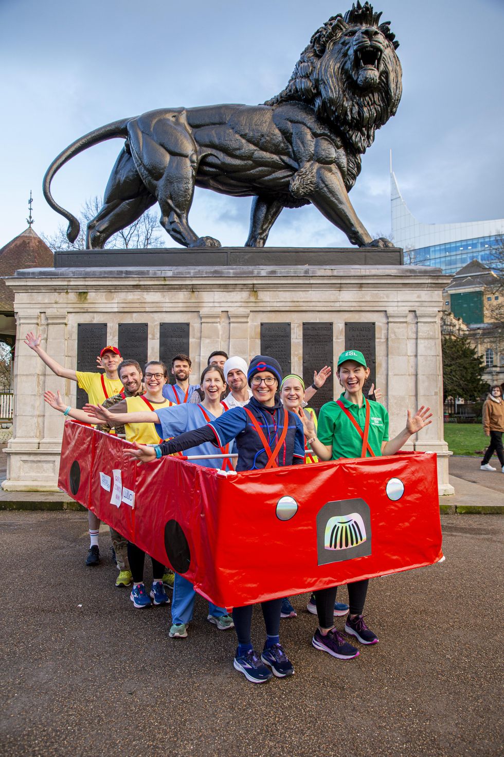 Jackie Scully in the bus outfit with nine of her friends