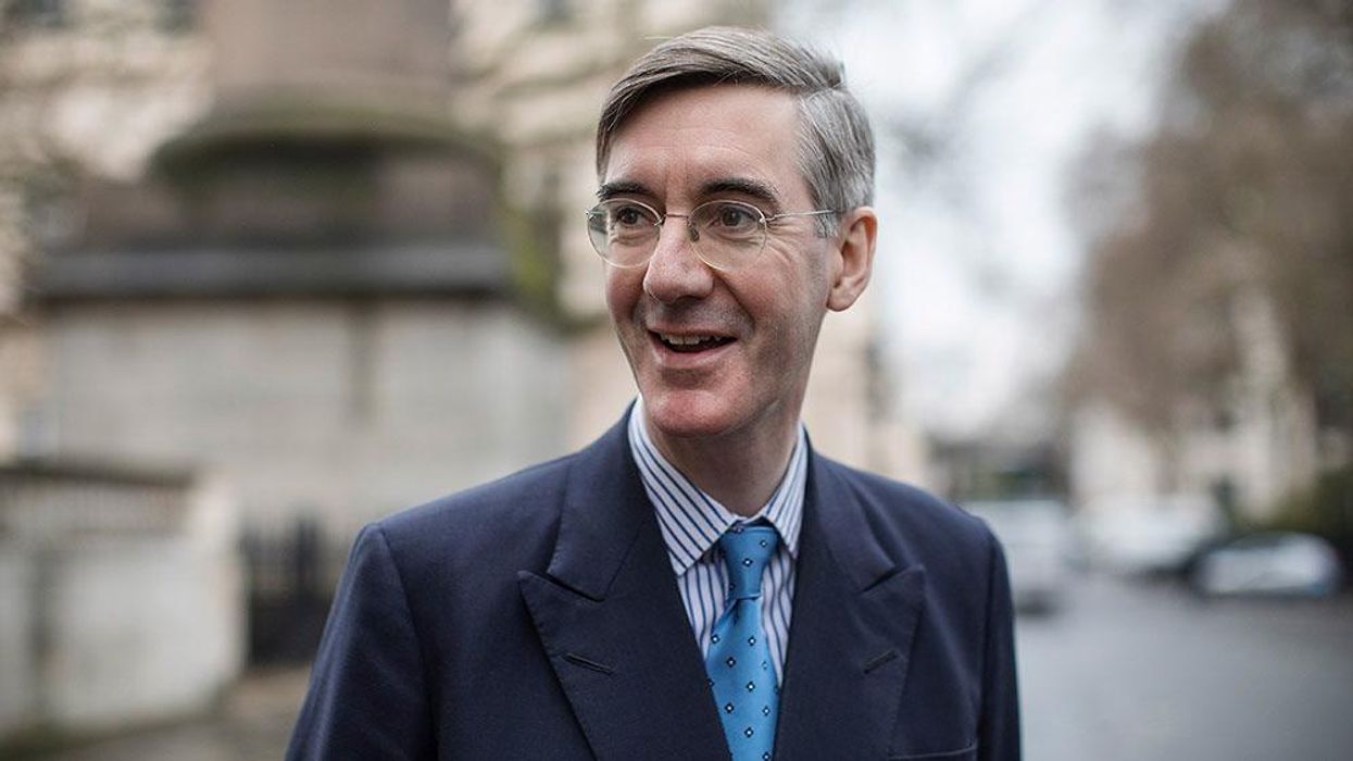 Jacob Rees-Mogg boasts of 'humming high street' in front of boarded up shop