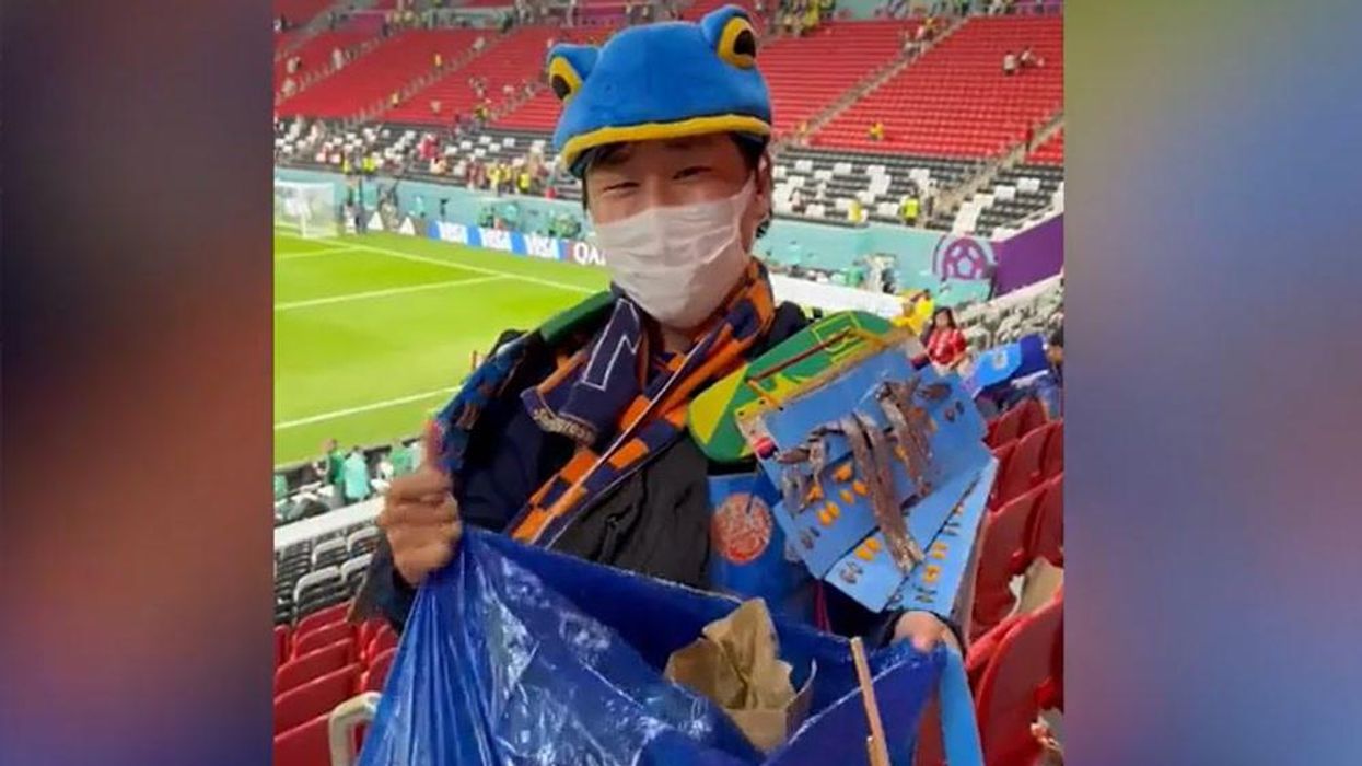 Japan's fans cleaned up the stadium after they beat Germany