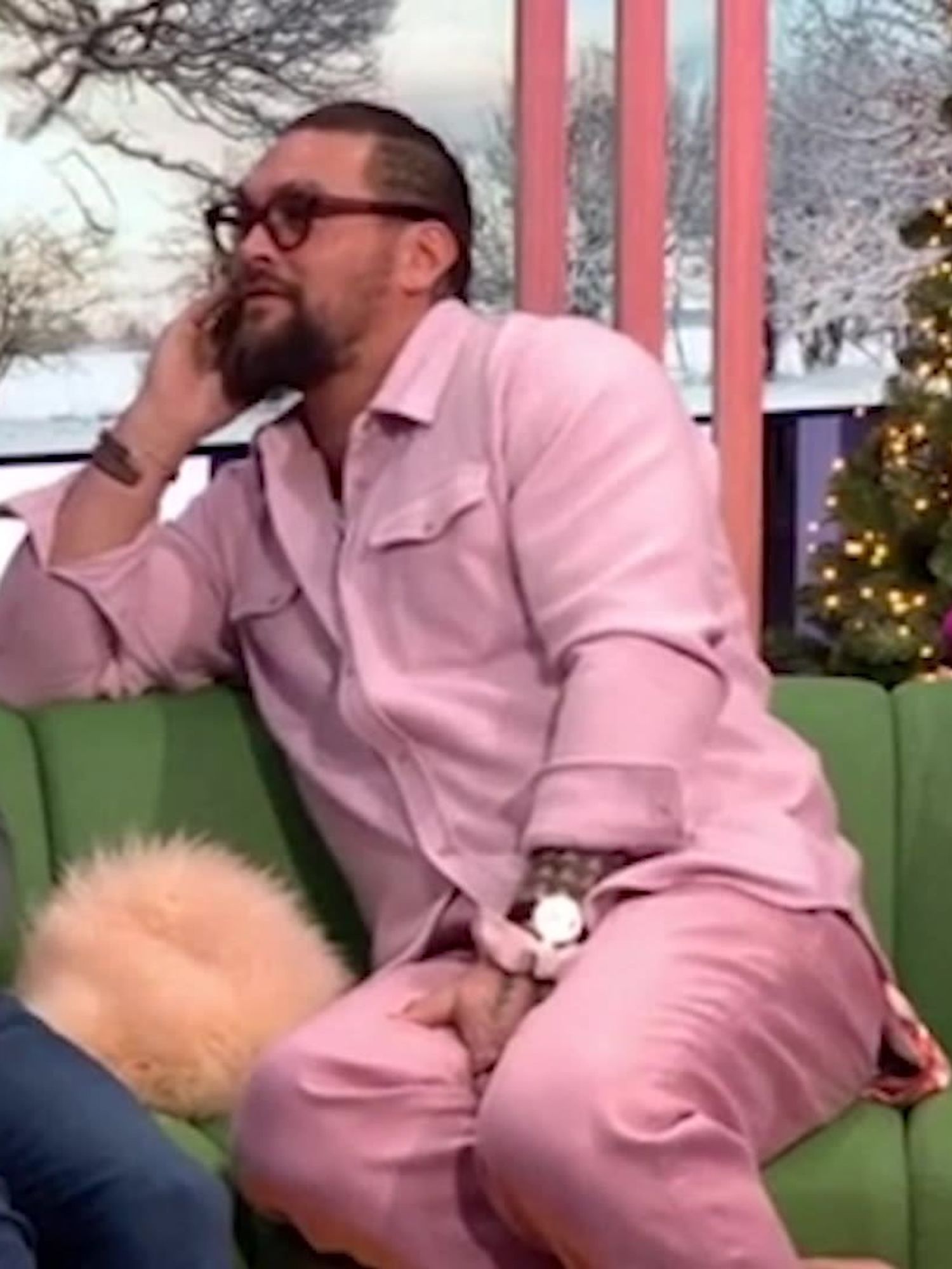 Jason Momoa sits with back towards Nigella Lawson as they both appear …