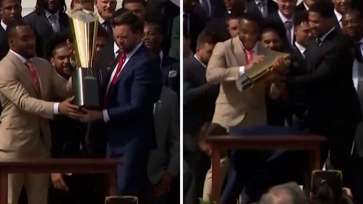 JD Vance broke a college football trophy on live TV the moment he touched it