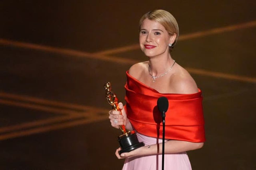 Jessie Buckley accepting the award for best actress during the Oscars ceremony
