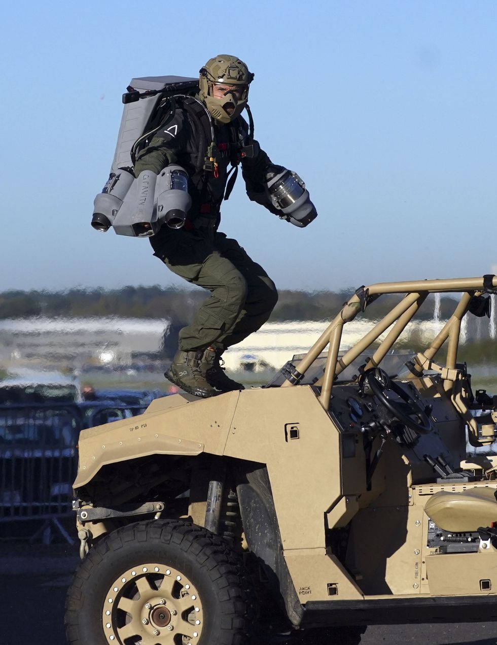 Jet Man lands on a vehicle (Steve Parsons/PA)