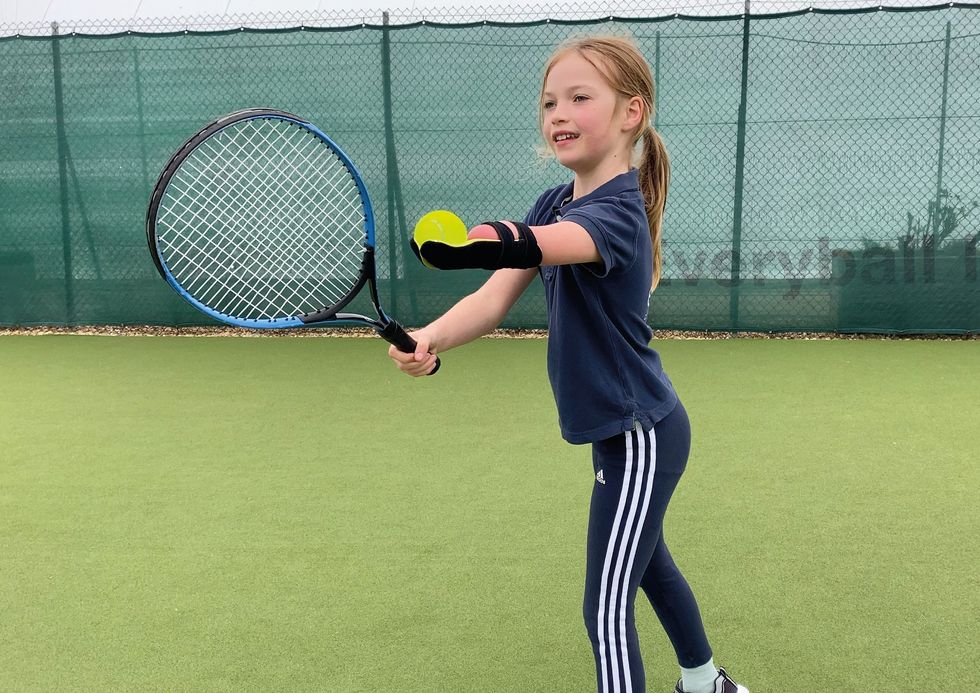 Tennis player with congenital limb difference ‘confident’ thanks to prosthetic