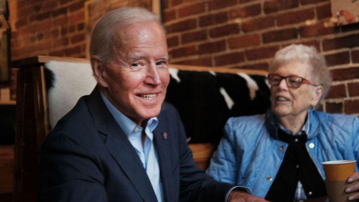 Joe Biden sweet talking a potential voter on the campaign trail in New Hampshire