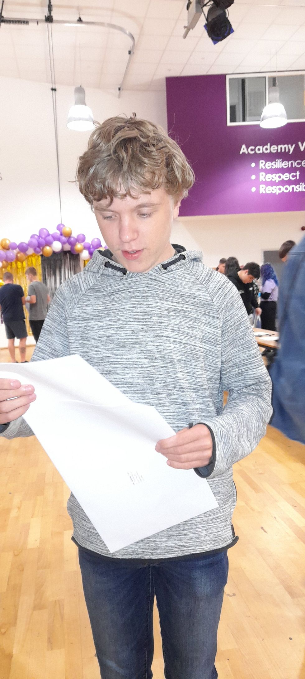 Joe Golinski receiving his A-level results (MJ Golinski/PA).