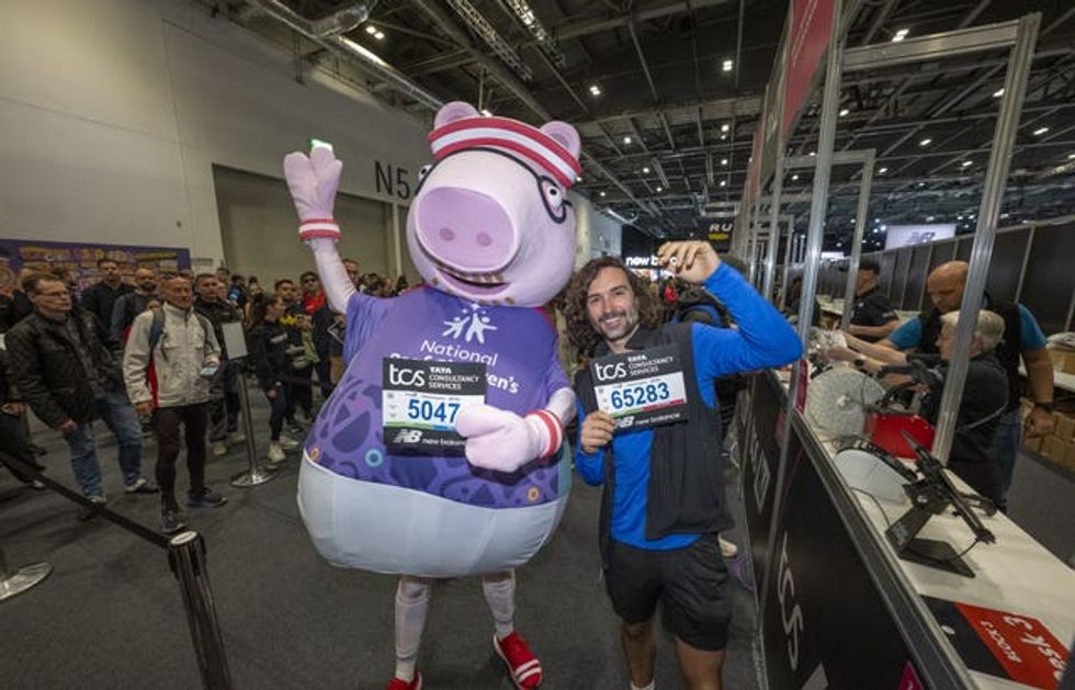 Joe Wicks and Daddy Pig collect their running bibs at the TCS London Marathon Running Show at Excel London, ahead of the 2026 TCS London Marathon