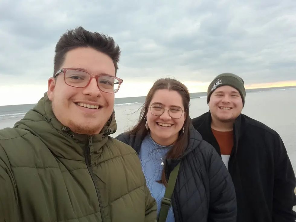 John, Anna and Josh standing together and smiling